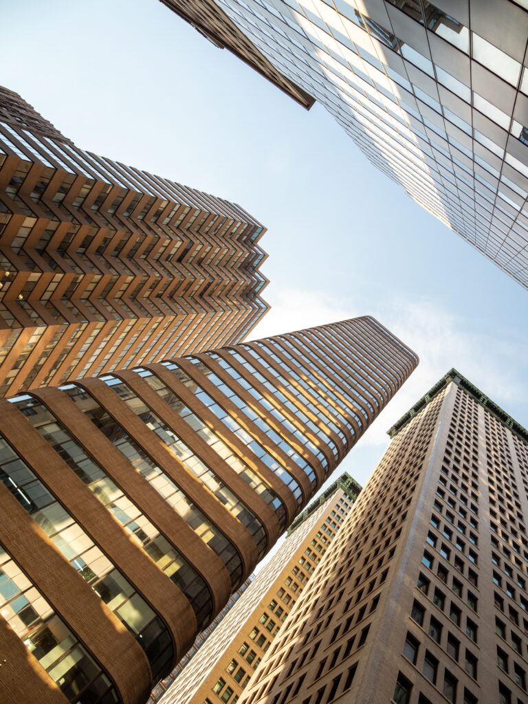low angle shot of buildings on 55 broadway in new york city, united states